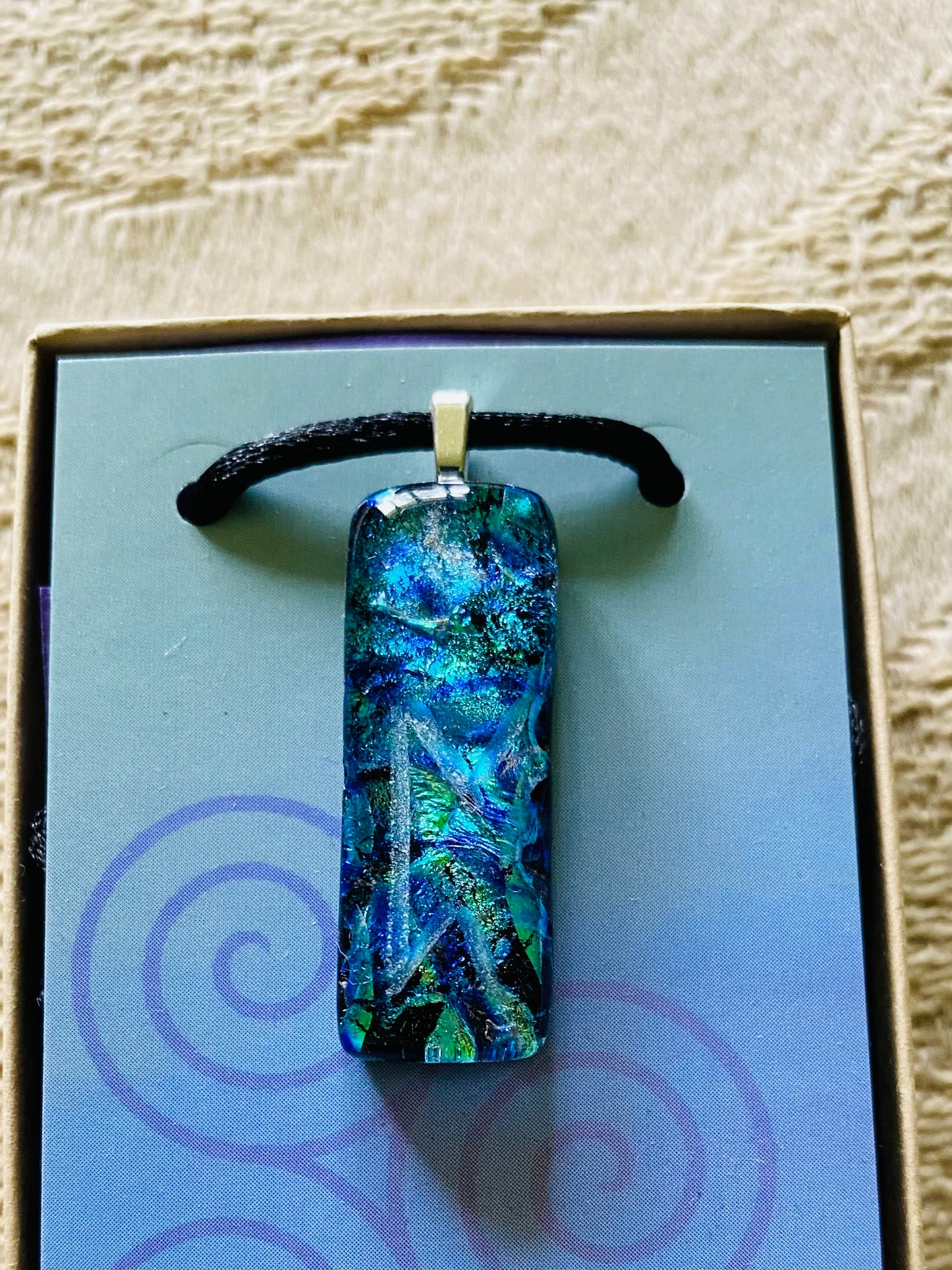Rune of Fate Dichroic Glass Pendant Perdhnro